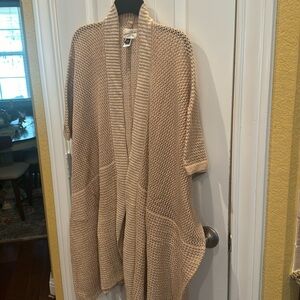 One size fits most, long open front sweater. Tan color.